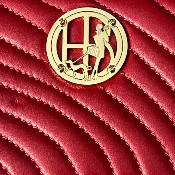 Henri Bendel red quilted wallet with a gold-tone logo. - Picture 3 of 16